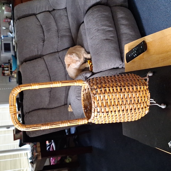 Other - Wicker basket -long handled with 3 metal feet measures 17 inches tall